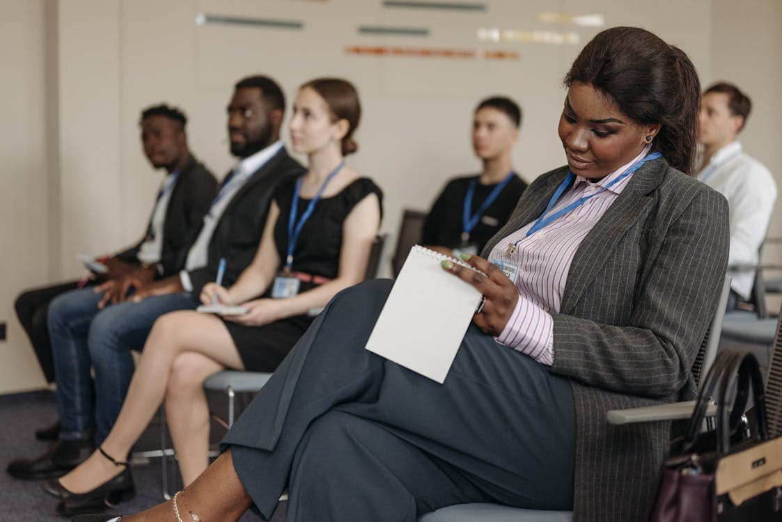 Adults in a professional workforce training seminar